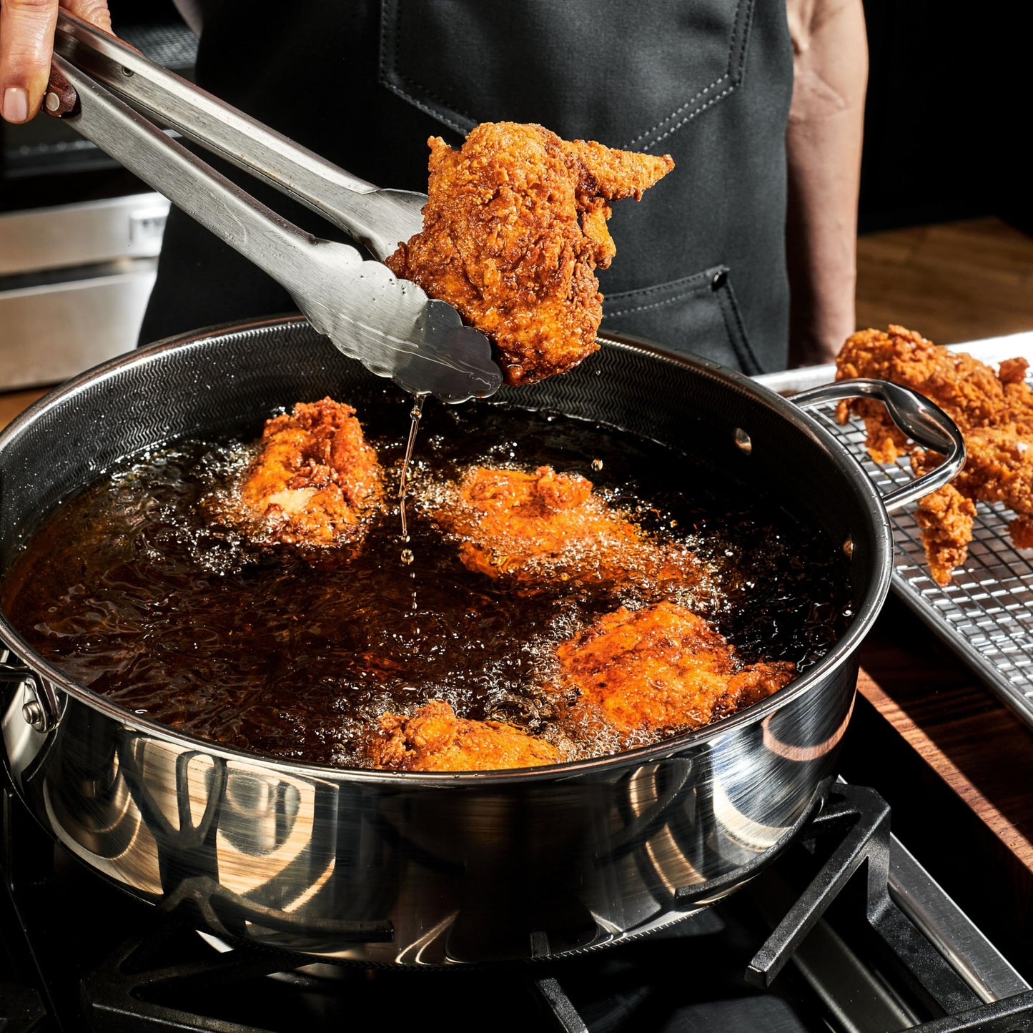 HexClad Hybrid Nonstick 7-Quart Sauté Pan with Tempered Glass Lid, Chicken Fryer, Stay-Cool Handles, Dishwasher-Friendly, Oven-Safe Up to 900°F, Induction Ready, Compatible with All Cooktops