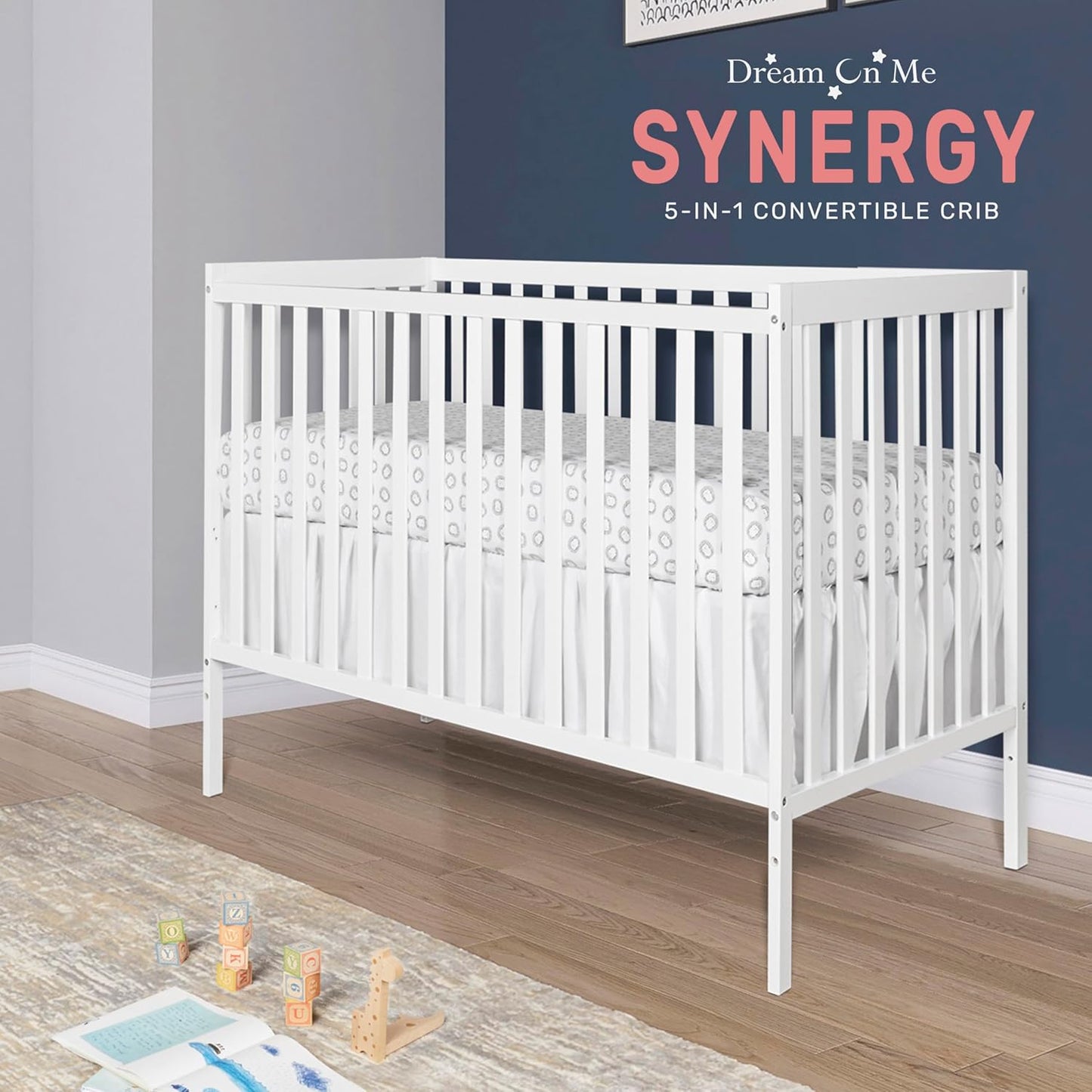 Synergy 5-In-1 Convertible Crib In White, made of New Zealand Pine wood, JPMA & Greenguard Gold Certified, features 3 mattress height settings