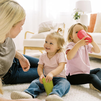 Dr. Brown's Milestones Cheers 360 Spoutless Transition Cup, Travel Friendly and Leak Free Sippy for Babies and Toddlers, Green and Pink, BPA-Free, 10 oz/300 mL, 9m+